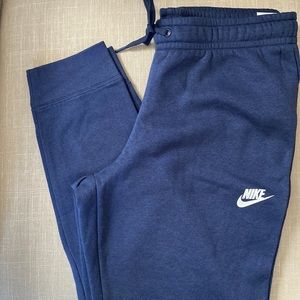 Women’s Nike Slim Fit Mid-Rise navy joggers. Size medium.